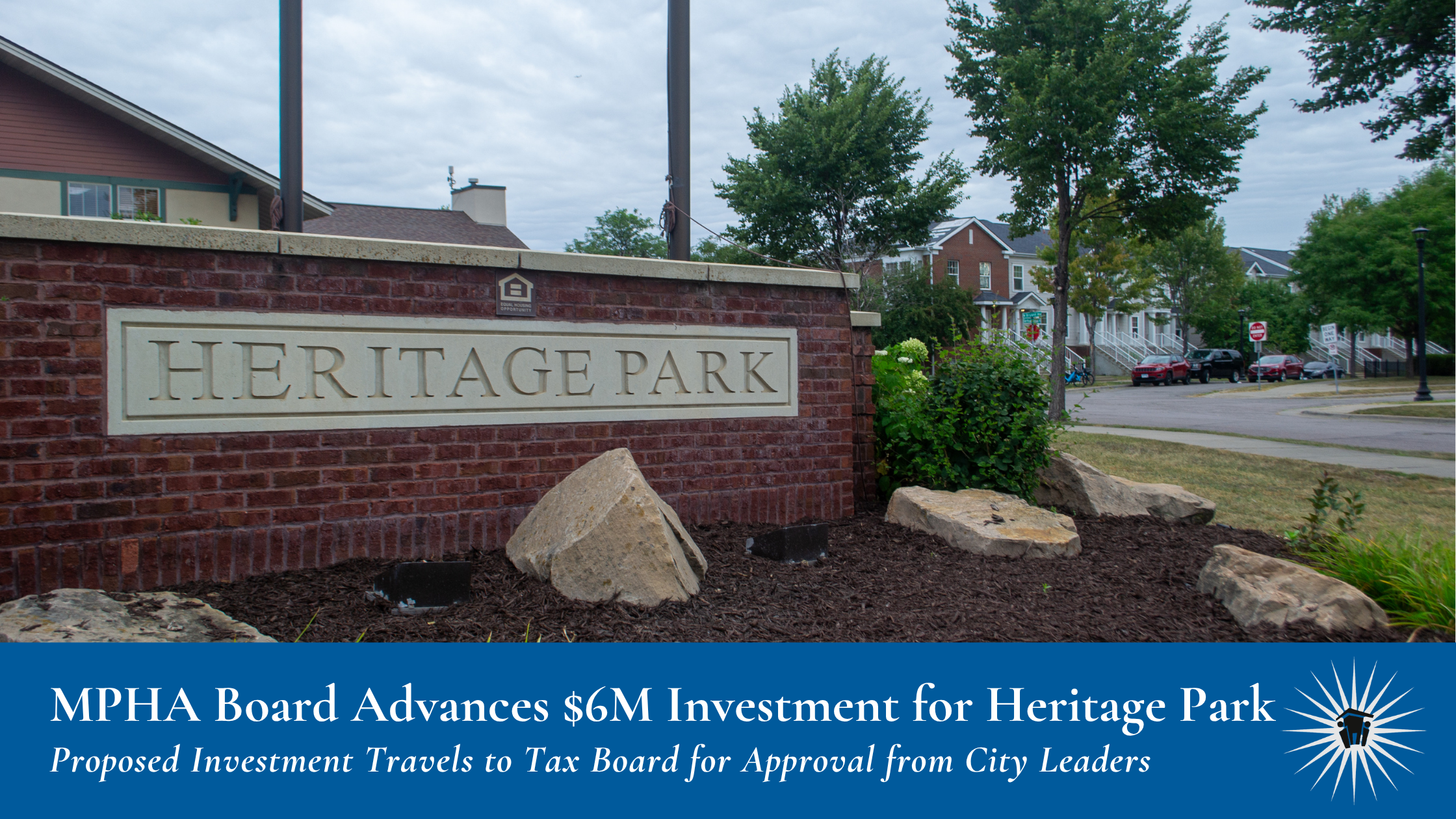 MPHA Board Advances $6M Investment for Heritage Park (5) A brick and stone Heritage Park sign sits in the foreground and townhomes are in the background. A banner at bottom reads: "MPHA Board Advances $6M Investment for Heritage Park, Proposed Investment Travels to Tax Board for Approval from City Leaders"