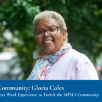 Women stands outside, smiling in front of trees. Banner at bottom reads: "Cultivating Community: Gloria Coles, Resident Leader Uses Work Experience to Enrich the MPHA Community"